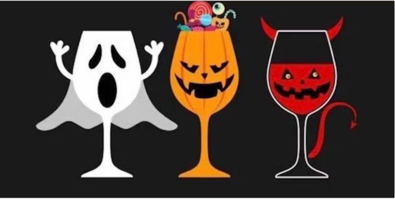 Wine glasses dressed in Halloween costumes.